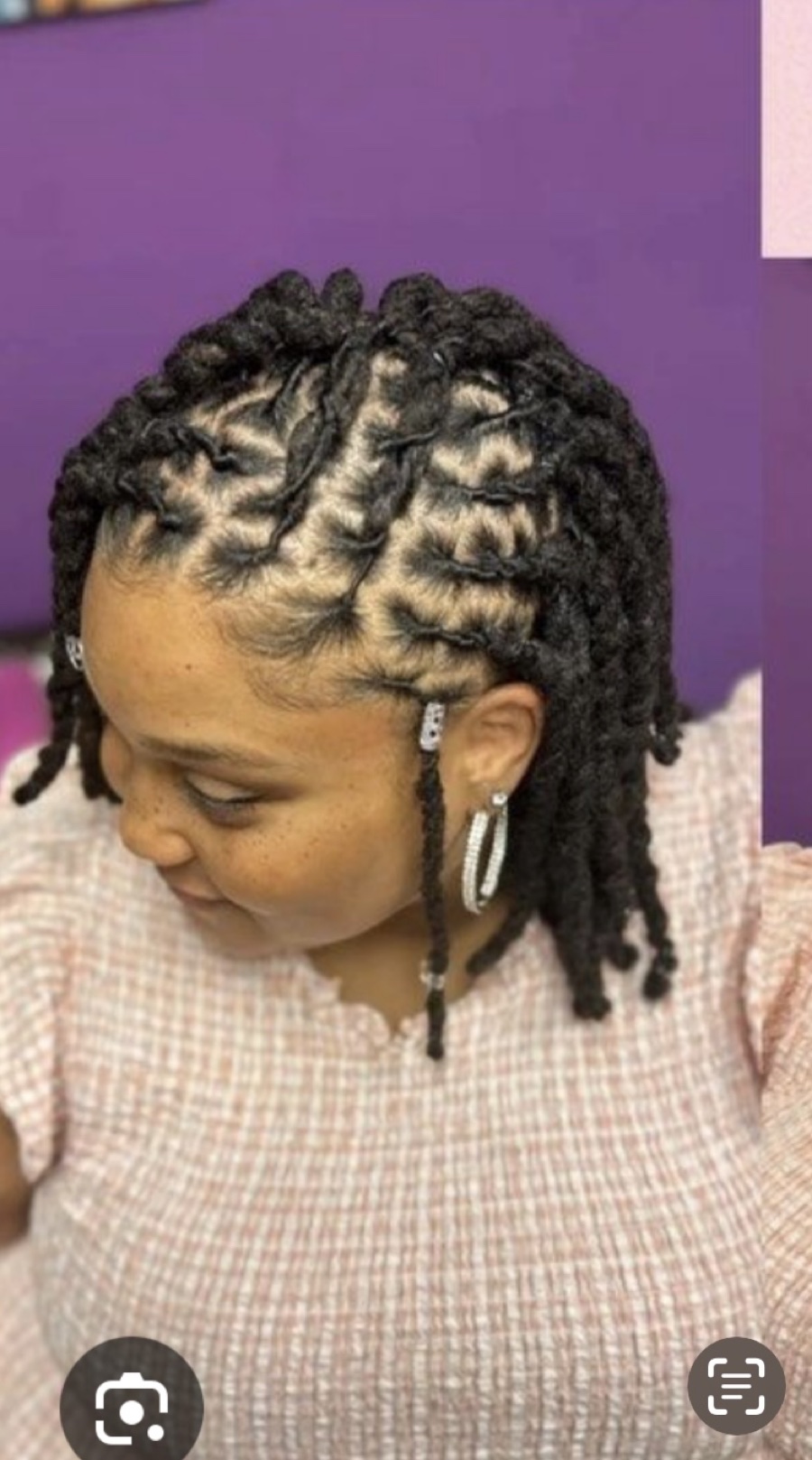 Detailed sister loc styling by Pretty Locs of Africa