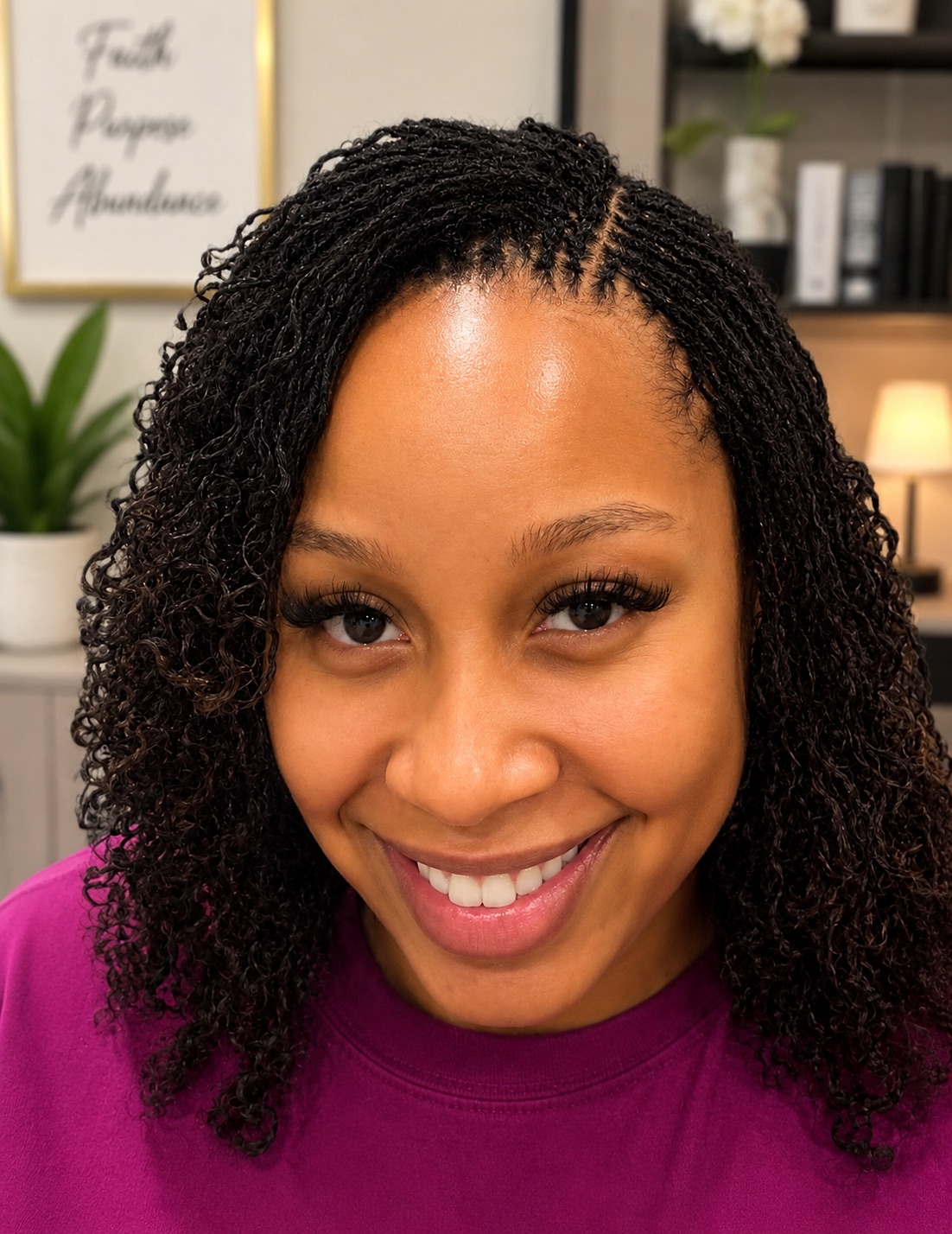 Smiling Pretty Locs of Africa client with fresh sister locs